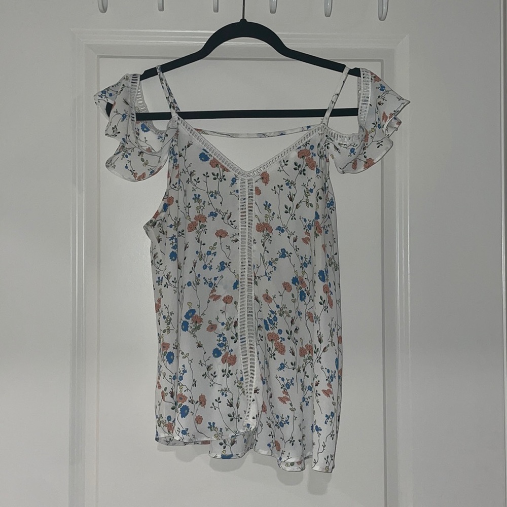 Off the shoulder, floral blouse.